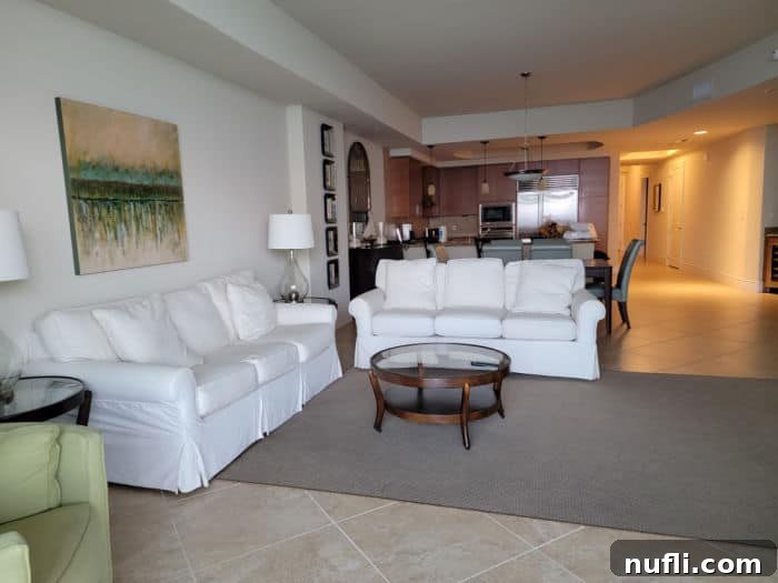 Turquoise Place: Orange Beach Alabama's Luxury Gulf Resort 7 White couches and loveseat, table, and kitchen