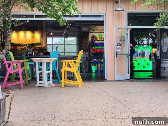 Comfortable Adirondack chairs outside Lulu's Beach Arcade