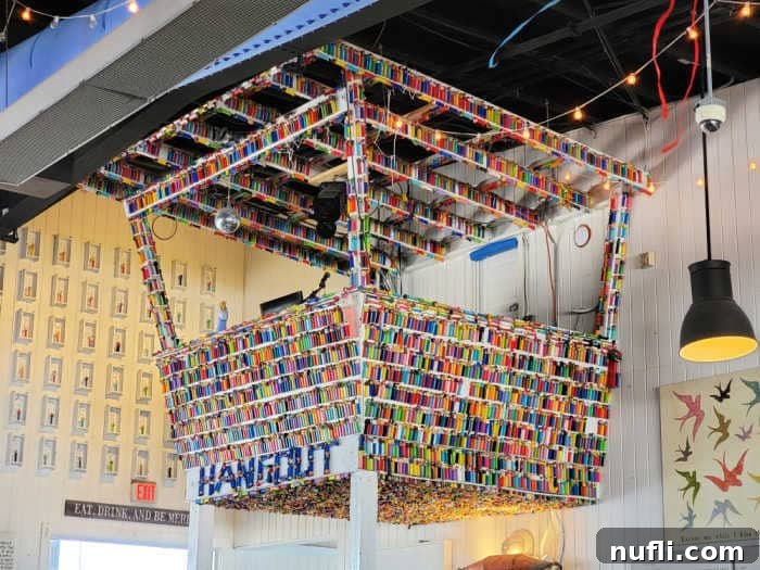 DJ booth at The Hangout completely decorated with hundreds of colorful Pez dispensers