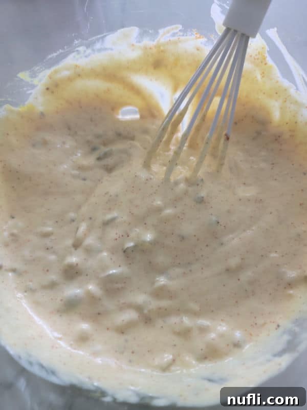 white whisk in a bowl with Big Mac Sauce