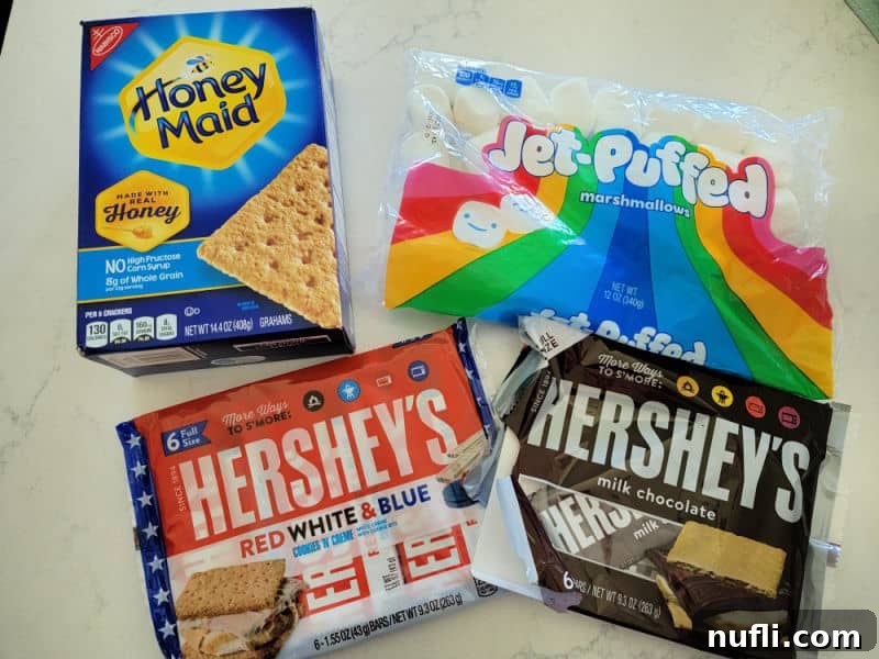 Oven Smores ingredients, honey maid graham crackers, jet puffed marshmallows, hershey chocolate bars. 