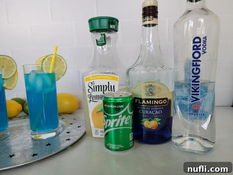 Electric Lemonade Cocktail ingredients, lemonade, sprite, blue curacao, and vodka with 2 cocktails 