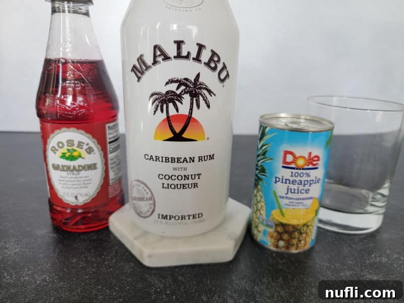 Ingredients for Malibu Sunset: Grenadine, Malibu coconut rum, pineapple juice, and an empty glass