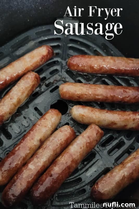 Crispy Air Fryer Sausages 2 Crispy golden-brown Air Fryer Sausage Links perfectly cooked and arranged in an air fryer basket, ready to be served for breakfast.