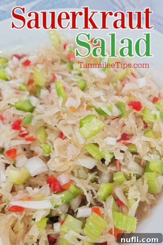 Simple and Delicious Sauerkraut Salad 2 Freshly prepared Sauerkraut salad in a white ceramic bowl, ready to be served as a healthy side dish.