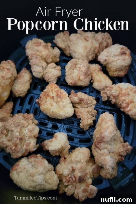 Air Fryer popcorn chicken text over chicken pieces in an air fryer basket