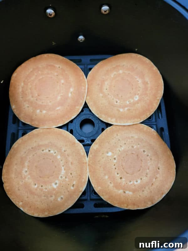 Frozen pancakes in an air fryer basket