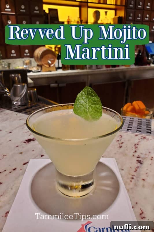 Alchemy Bar's Revved-Up Mojito Martini Elixir 2 Revved up Mojito Martini over a stemless martini glass on a Carnival white napkin