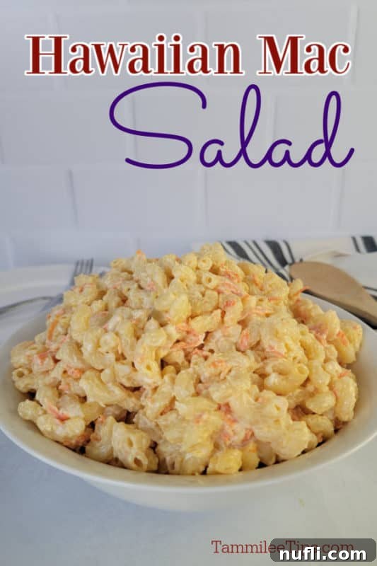 Hawaiian Mac Salad over a white bowl with mac salad and a wooden spoon