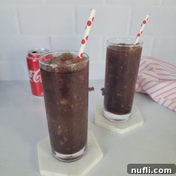 Coke Slushie Recipe with a red polka dot straw