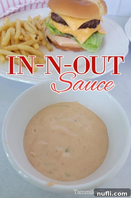 Homemade In n Out Sauce in a bowl next to a double-double burger and crispy french fries