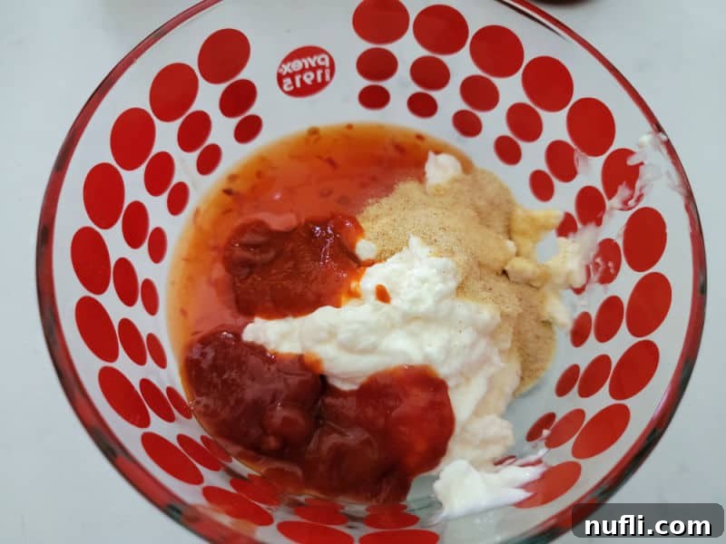 ketchup mayo and spices in a glass bowl 