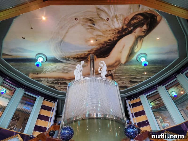 goddess mural on the ceiling above the Carnival Miracle atrium 