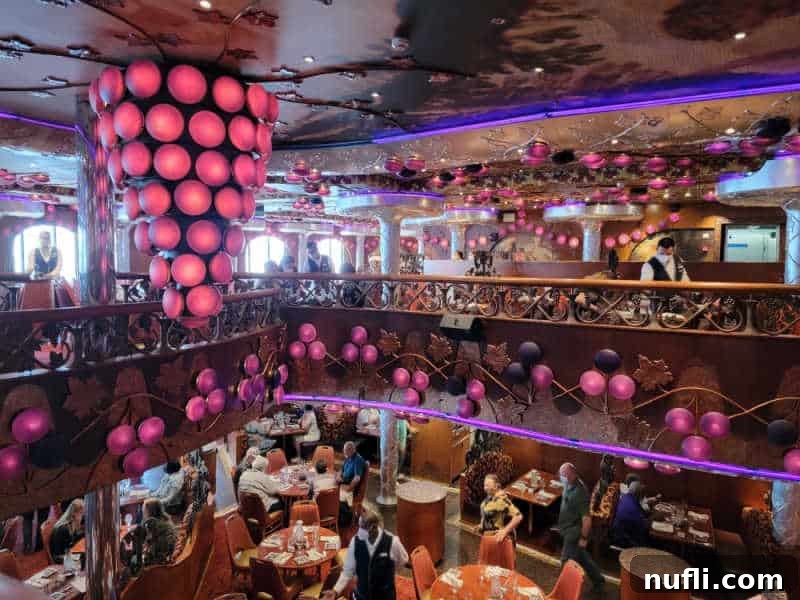 Carnival two story dinings room with grapes and purple lights 
