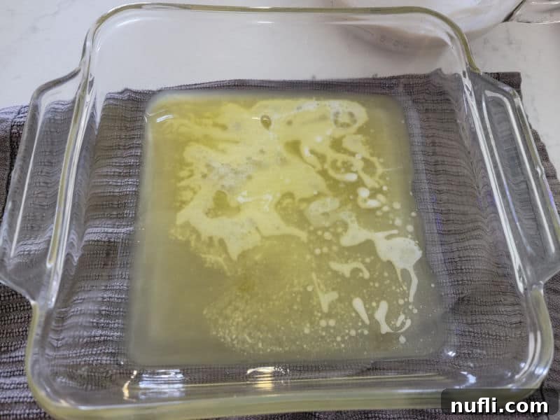 Melted butter in a glass baking dish