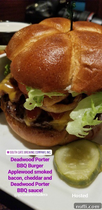 Burger with a Southgate Brewing company text and deadwood porter bbq burger info next to it