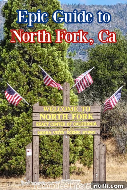 Unlocking North Fork California 2 Welcome to North Fork, CA sign with American flags, inviting visitors to explore the area.
