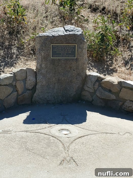 Unlocking North Fork California 6 Center of California sign on a rock, marking the geographic heart of the state.