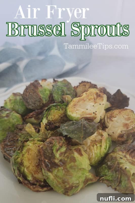 Air fryer brussel sprouts over a plate with a pile of air fried brussel sprouts 