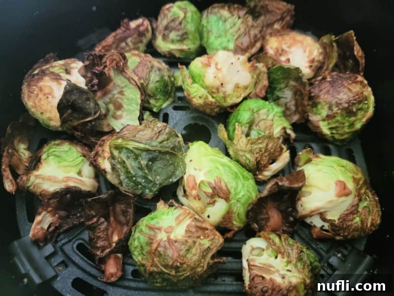 Air fried Brussel sprouts in an air fryer basket