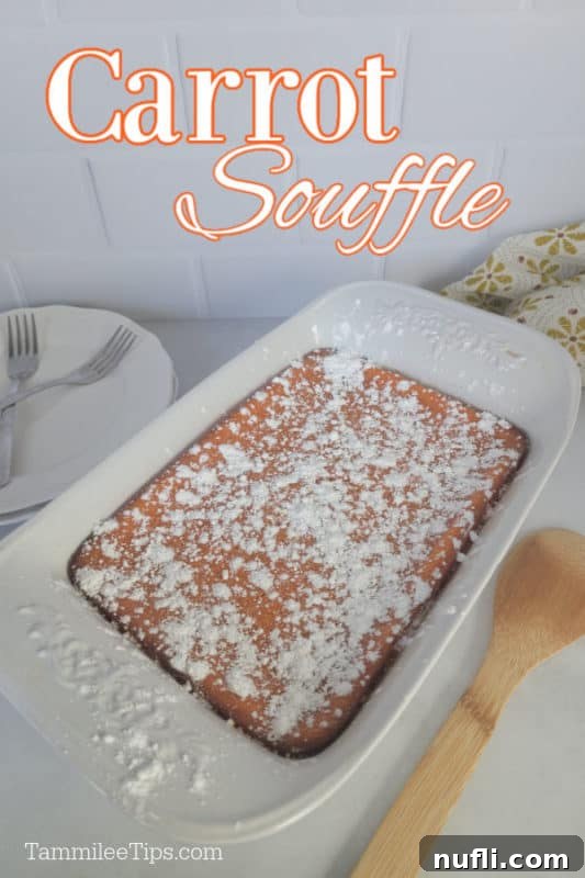 Easy Fluffy Carrot Soufflé 2 Carrot Souffle, a golden-brown casserole dish dusted with powdered sugar, ready to be served