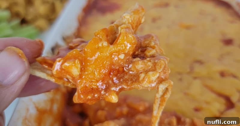 Epic Buffalo Chicken Dip Recipe in a white casserole dish