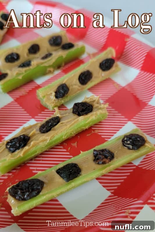 Ants on a Log: celery sticks filled with peanut butter and topped with raisins on a charming red and white gingham plate, a healthy snack for kids