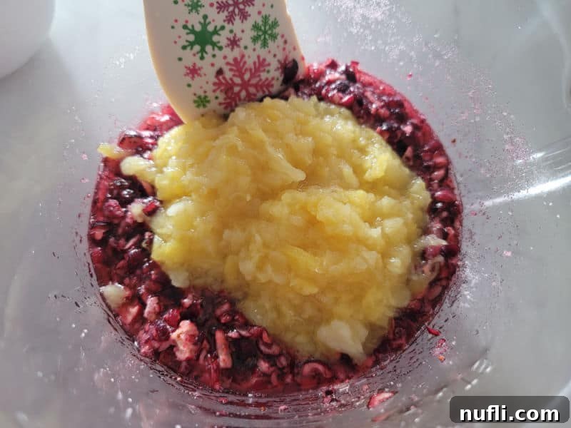 Quick and Easy Cranberry Fluff Salad 6 crushed pineapple mixing into shredded cranberries for cranberry dessert salad