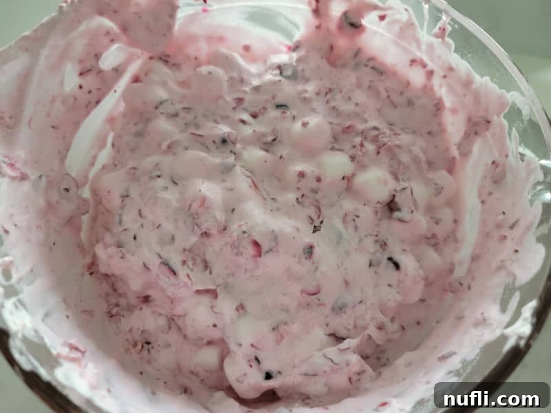 Quick and Easy Cranberry Fluff Salad 9 Cranberry Fluff Salad in a glass bowl