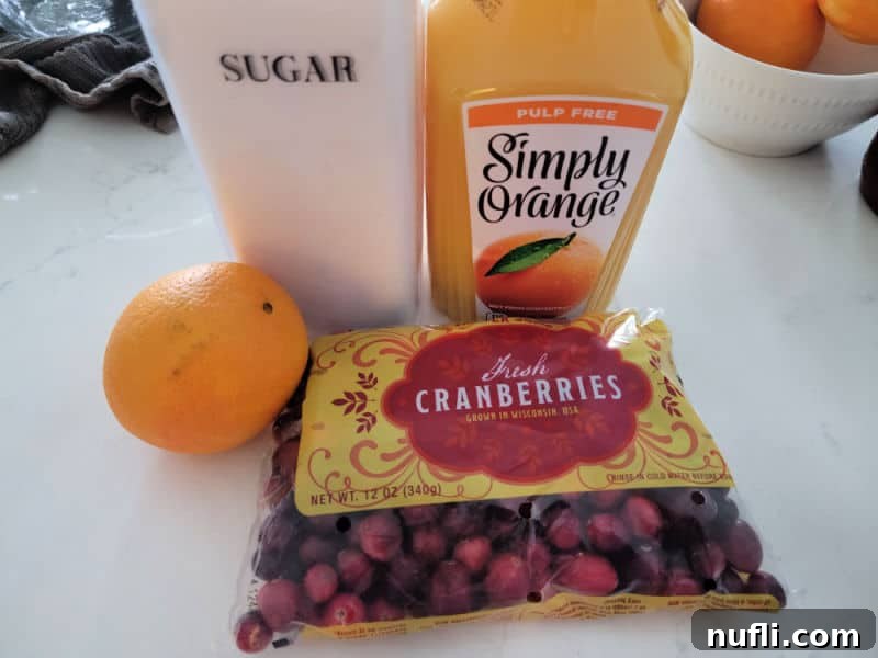 Cranberry Sauce ingredients, orange, sugar, orange juice, fresh cranberries