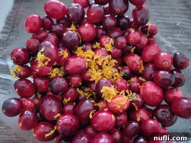 fresh cranberries and orange zest for easy cranberry sauce recipe