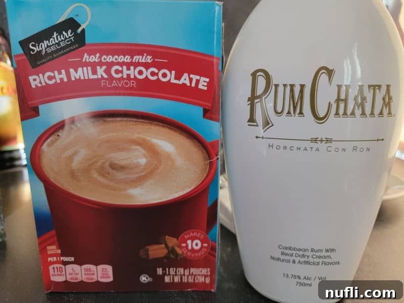 Effortless RumChata Hot Chocolate Treat 3 RumChata Hot Chocolate ingredients, dry cocoa mix and RumChata Horchata Con Ron