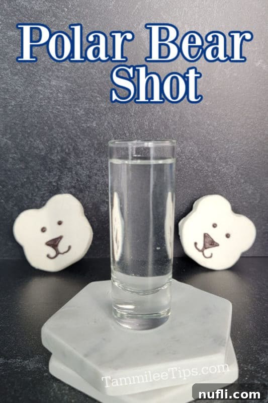 Polar Bear Shot text written above 2 polar bear marshmallows and a shot glass filled with a clear polar bear shot