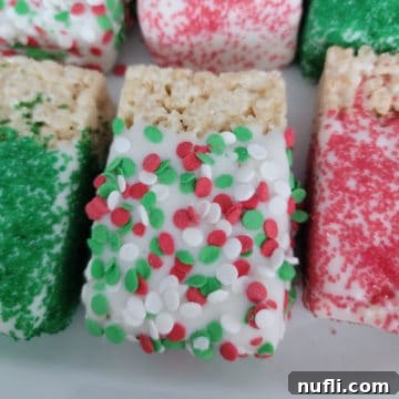 Crispy Chocolate Dream Bites 9 Chocolate Covered Rice Krispie Treats on a white platter