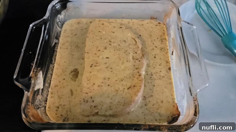Effortless Eggnog French Toast 6 Eggnog French Toast soaking in the eggnog mixture