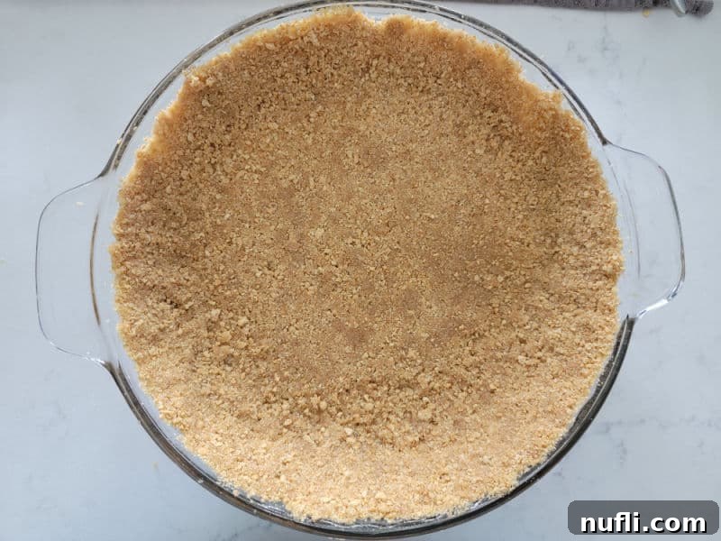 Graham Cracker Crust in a glass pie pan