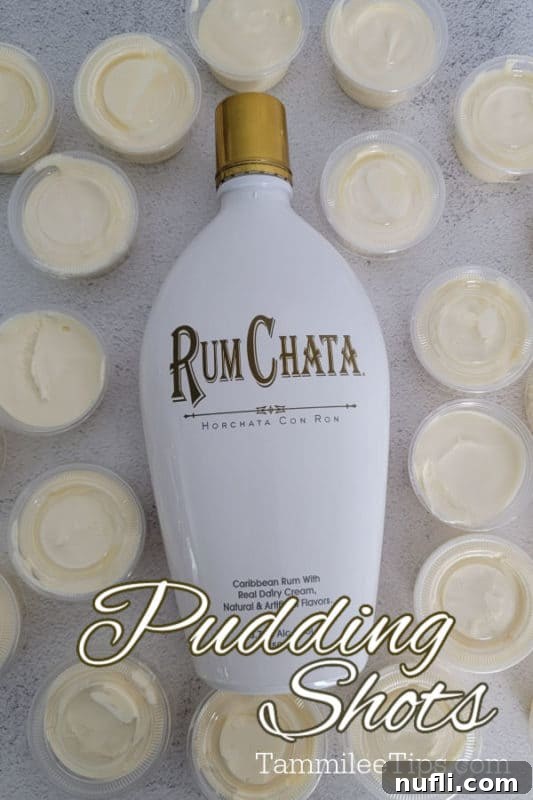 RumChata Pudding Shots in shot cups with a bottle of RumChata, indicating an easy party dessert