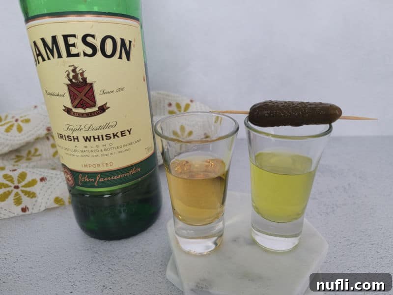 Jameson Irish Whiskey next to a Pickleback Shot