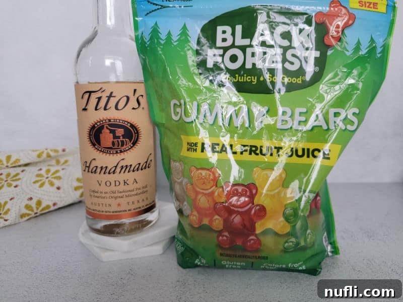 Tipsy Teddies 4 Tito's vodka bottle next to a large bag of Black Forest Gummy Bears