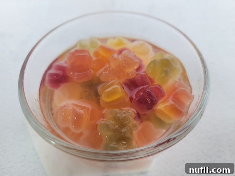 Tipsy Teddies 7 Gummy bears in a glass bowl with clear liquid