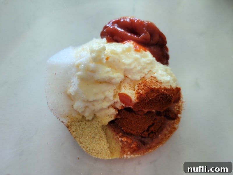 Effortless Homemade Yum Yum Sauce 4 Homemade Yum Yum Sauce ingredients in a bowl prior to mixing