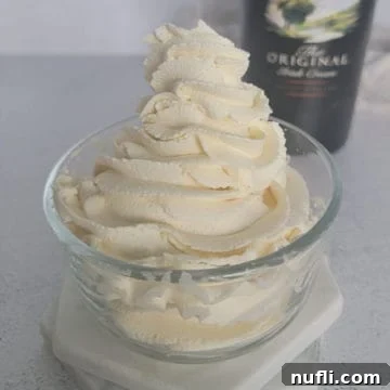 Bailey's Whipped Cream swirled in a glass bowl