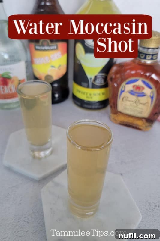Water Moccasin Shot text over two filled shot glasses next to four bottles