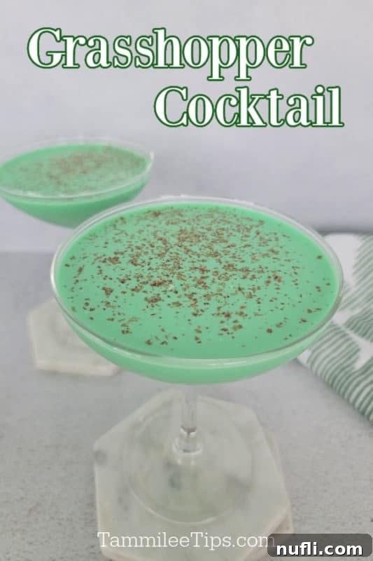 Grasshopper Cocktail over two coupe glasses filled with a green cocktail and garnished with chocolate shavings