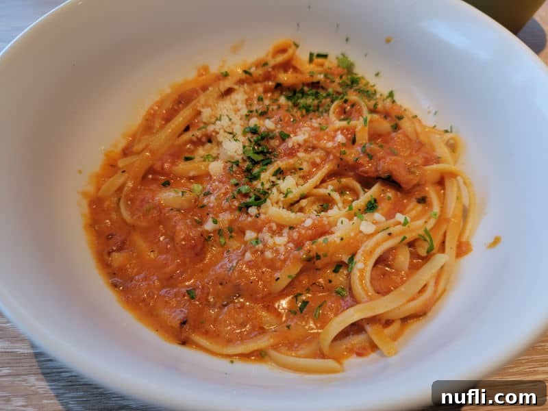 Carnival Radiance 4-Day Baja Mexico Escape 11 Pasta with red sauce in a white bowl