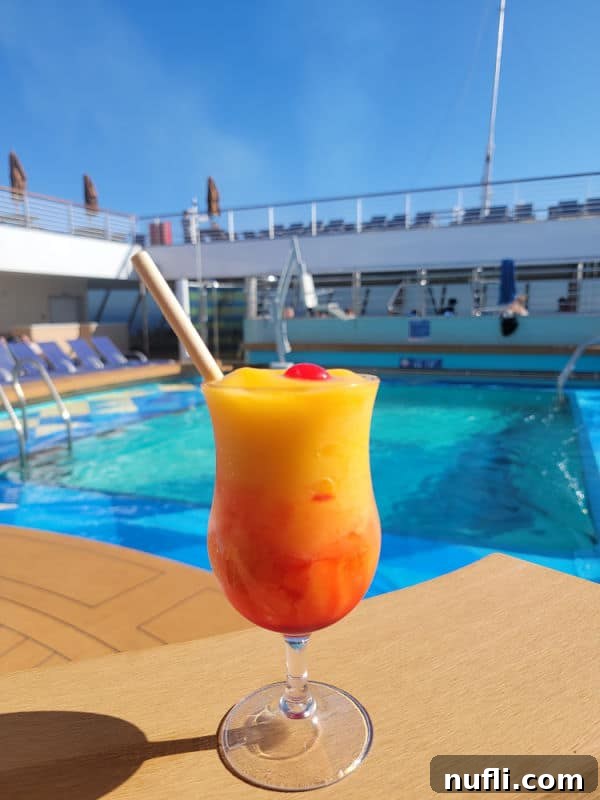 Carnival Radiance 4-Day Baja Mexico Escape 19 tropical cocktail next to the pool