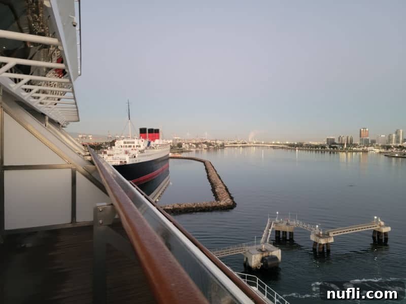 Carnival Radiance 4-Day Baja Mexico Escape 21 historic ship next to the cruise ship looking down from the balcony