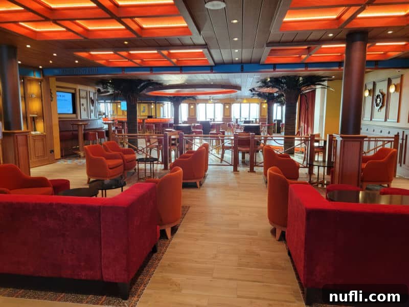 Red lounge chairs in a large bar