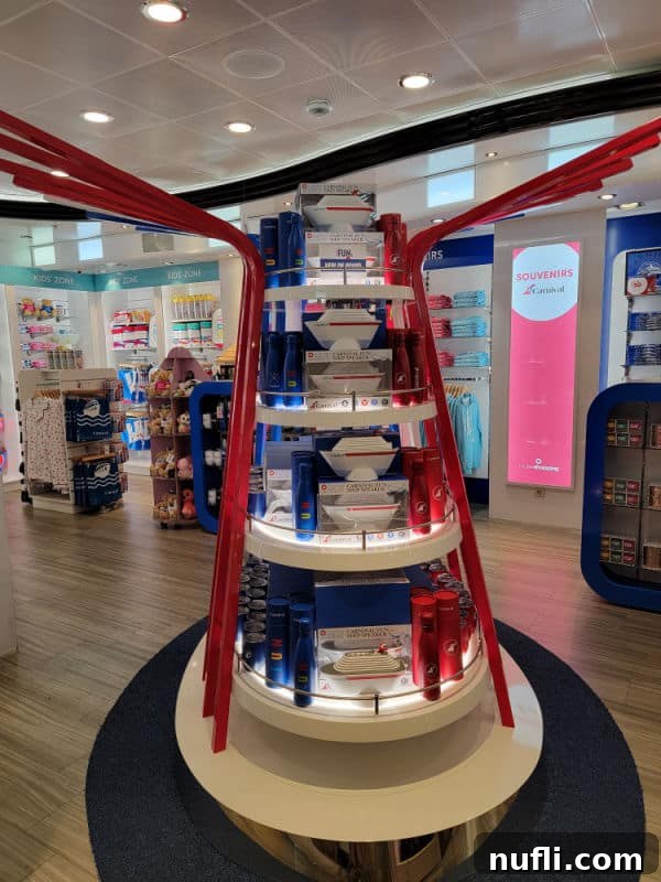 Carnival souvenir gift shot with cruise ship shaped speakers on a display