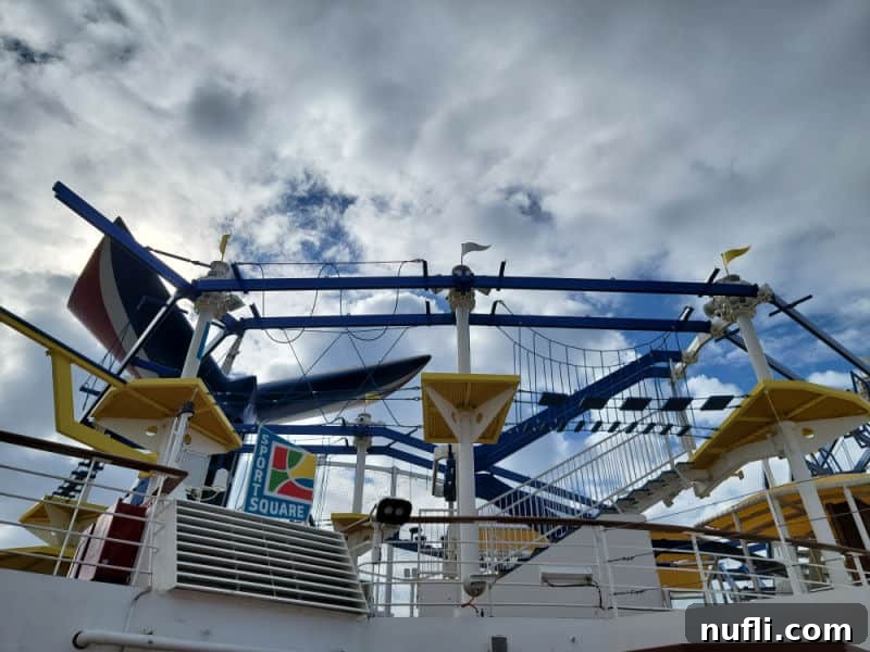 Sky course walkway over sports square sign and Carnival funnel